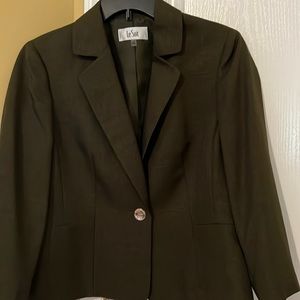 two piece skirt suit size 12 never worn new with tags.  Olive green